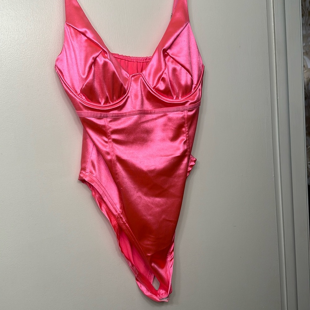 Hot pink body suit